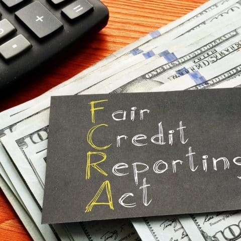 La Ley de Informe Justo de Crédito (FCRA) se muestra en la foto del negocio utilizando el texto.